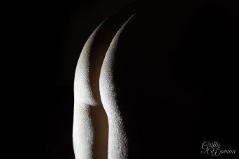 Photograph of buttocks that look like a giant moon