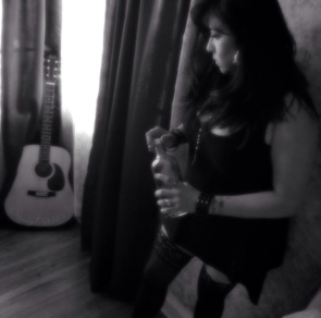 sexy woman with guitar and whisky