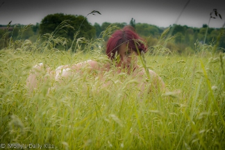Molly in field of long grass