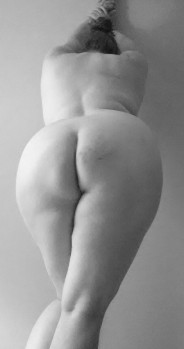 Black and white portrait of a nude womans back