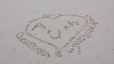 Love heart drawn in the sand