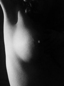 Black and white low light photo of female nude sinful sunday