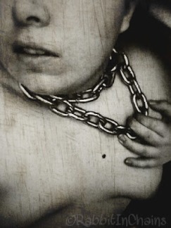 Image of woman with chain around her neck 