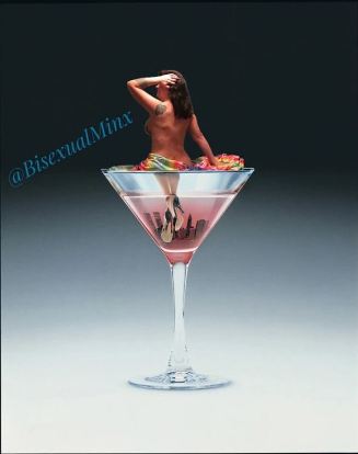 Image of cocktail glass edited to make it look like Minx is sitting naked in it