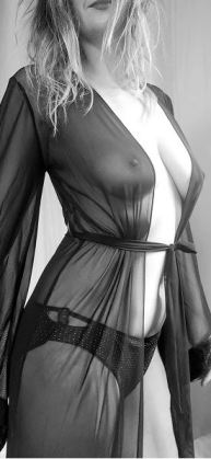 black and white picture of tabitha is see-through long dressing gown