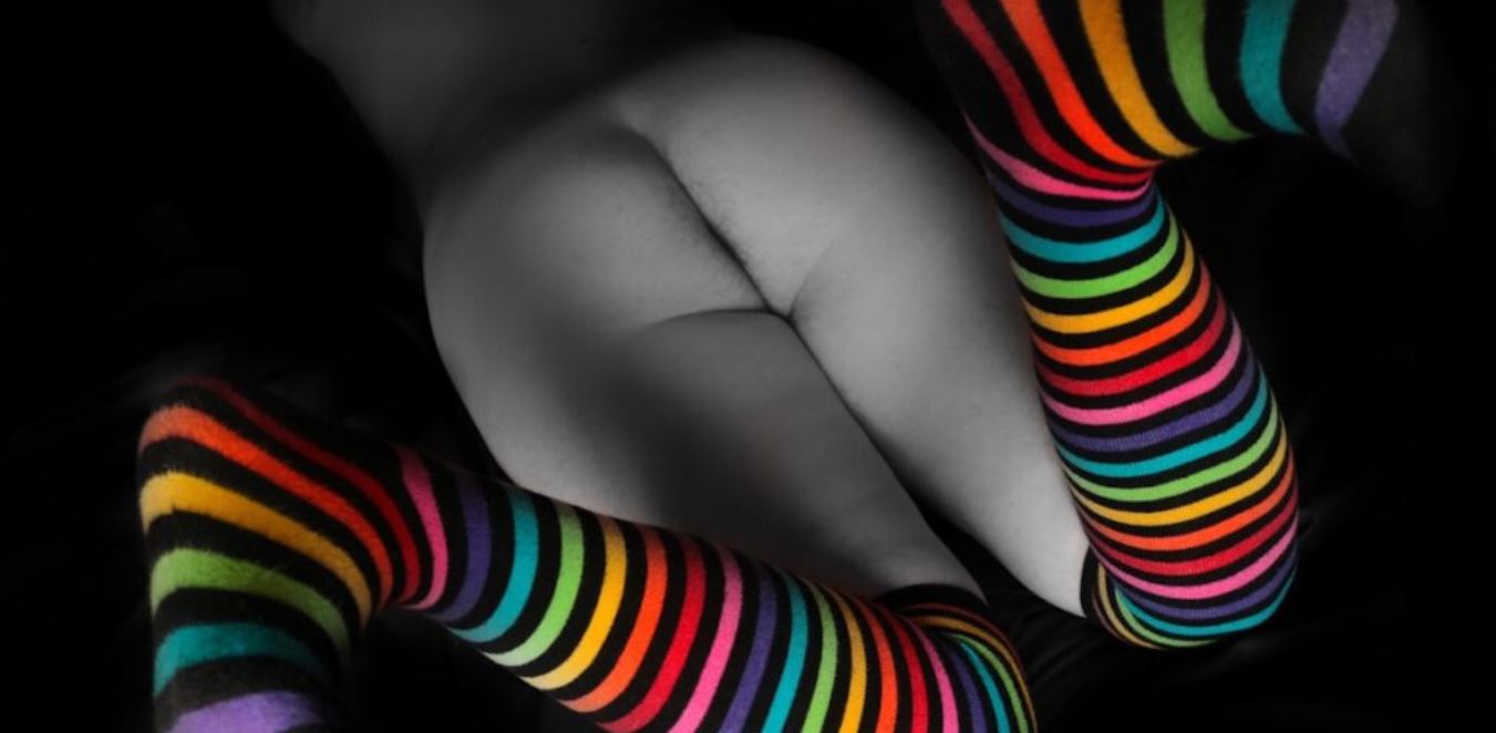 Cropped image of missy wearing striped knee high socks