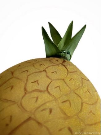 Breast painted to look like a pineapple